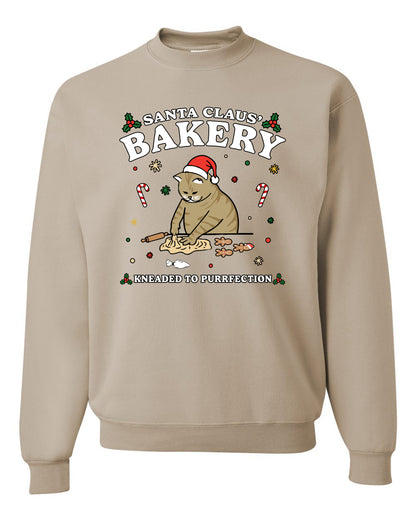 Santa Claus Bakery | Bread Kneaded to Purrfection, Funny Cute Cat Chef Baker Joke Ugly Christmas Unisex Crewneck Sweatshirt